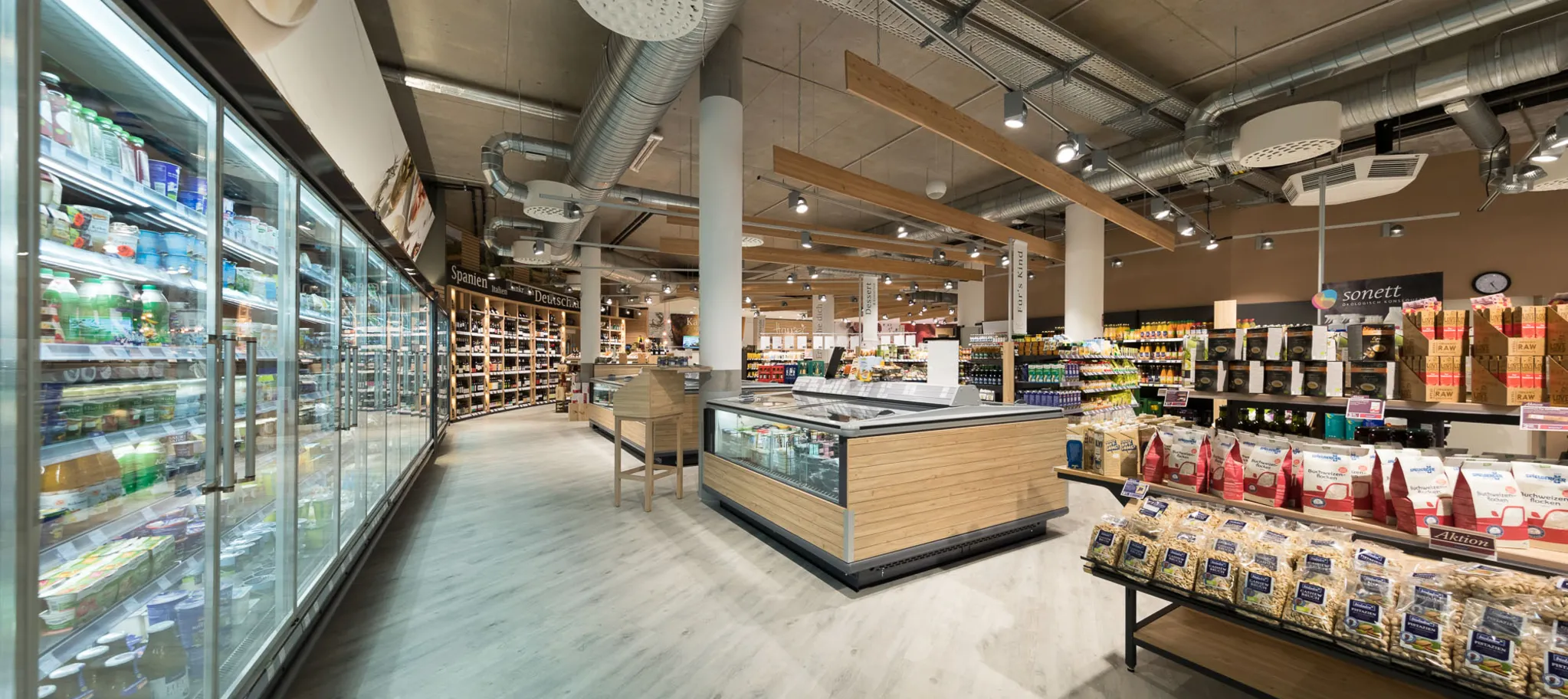 wineo Purline Bioboden Holzoptik Kühlregal Lebensmittel Biomarkt